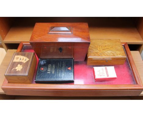 A Victorian mahogany sarcophagus shaped tea caddy together with a table top cabinet, The "Sandringham" Whist cabinet, an inla