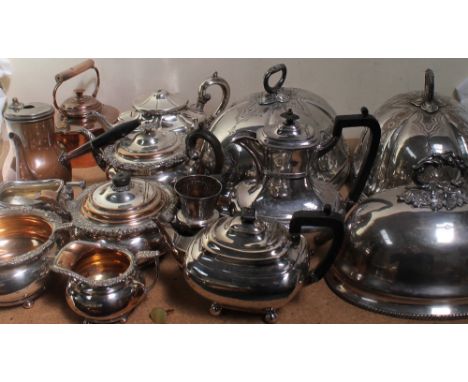 A collection of electroplated wares including dish covers, part tea service, copper items etc
