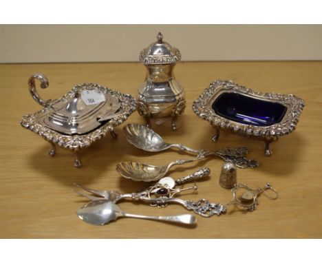 A small collection of silver and silver plated items, including silver flatware, a small trowel bookmark, a pair of gemstone 