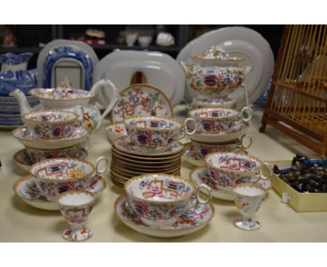 A quantity of late 19th Century Minton porcelain tableware, in the 'Chinese Tree' pattern, including tea pot, teacups and sau