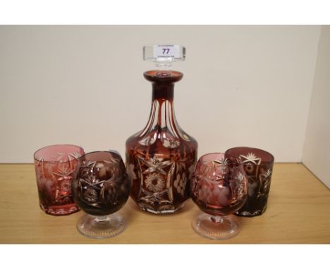 A 20th Century German overlaid ruby flash glass decanter by Echt Bleikristall, measuring 26cm, two brandy balloons, whisky tu