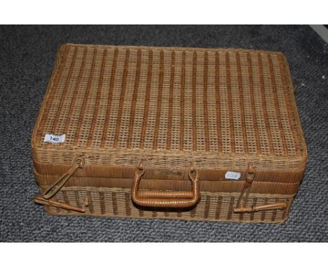 A vintage wicker picnic basket, measuring 19cm x 30cm x 46cm overall