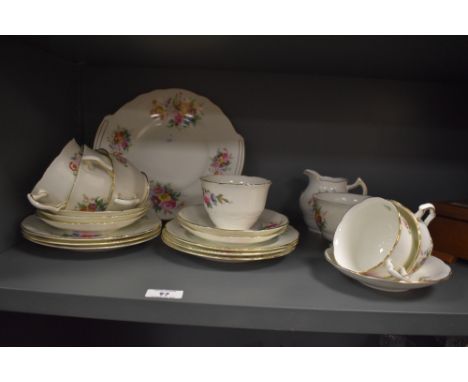 A mid-20th Century Coalport 'Junetime' patterned tea set, to include teacups and saucers, side plates, sucrier, and milk jug
