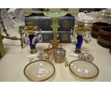 A pair of early 20th Century moulded glass pin dishes, possibly Jobling glass, within gilt metal mounts surmounted with hand 