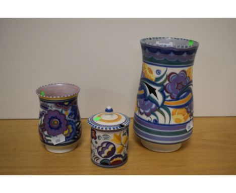 A Carter Stabler Adams Poole pottery vase, a smaller Poole pottery vase and a Poole pottery preserve pot and cover, each deco