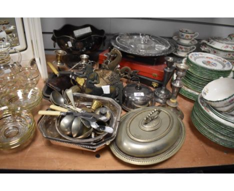 A selection of assorted silver plated ware, to include a punch bowl and ladle, lidded entree dish, candle sticks, and other m