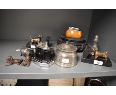 A Ronson 'Touch-Tip' table lighter, a Ronson table lighter with wooden base surround, a pair of 1930's cast metal and black m