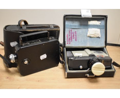 A 1960s Sankyo 8cm film camera with case, a Kodak Eight Model 20 cine camera, and case