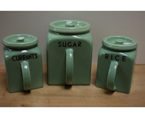 A group of three vintage Bristol Kitchen Ware handled storage jars, with covers, named Sugar, Currants and rice, printed mark