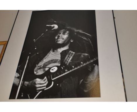 Bob Marley,  a large b/w print (77cm x 100cm approx) of Bob Marley performing at Hammersmith Odeon 1978 by Denis Morris frame