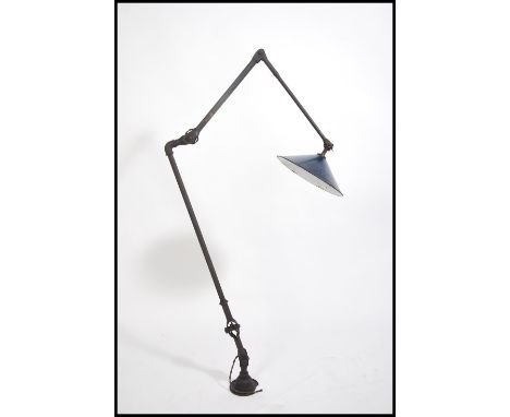 A good early 20th century Industrial factory anglepoise wall lamp light of long form with stunning blue UFO style enamel pain
