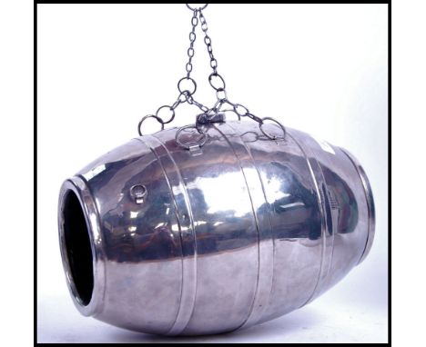 A rare believed Victorian magicians magic trick drinking barrel. Made of chrome plated steel, with holding chain to top. From