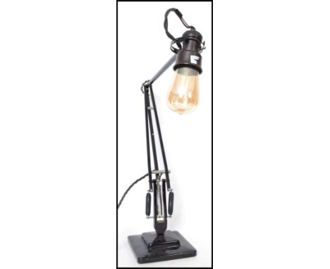 A Herbert Terry black anglepoise 1227 two step anglepoise desk lamp with unusual edison style bakelite large bulb