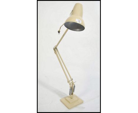 A vintage 1940's Herbert Terry model 1227 Industrial anglepoise desk lamp raised on twin square terraced base having pendant 