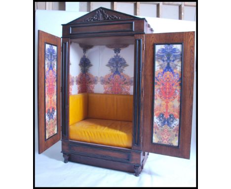 A 20th century contemporary ecclesiastical style seating booth, originally designed for a London club. It comprises of a wood