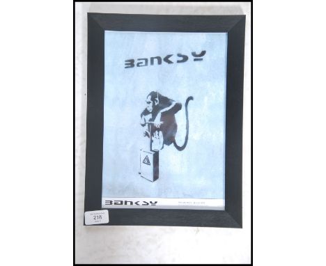 A graffiti urban art print by Bristol Street artist Banksy TNT Monkey entitled 1999  number 3/50 framed and glazed on A4 gicl