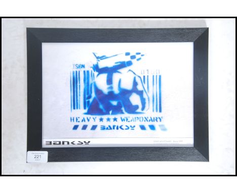 A graffiti urban art print by Bristol Street artist Banksy entitled Heavy Weaponary 1999  number 3/50 framed and glazed on A4