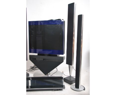 An exceptional Bang & Olufsun entertainment system comprising beocentre hi-fi with television on B&O stand with inverted tria