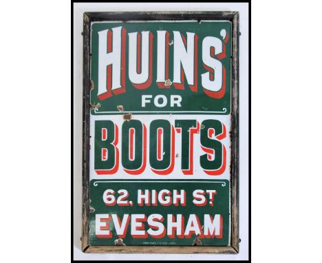 A rare early 20th century enamel shop advertising sign for Bruins. The sign in original wooden surround. Green background wit