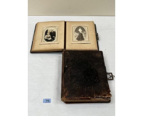 Two Victorian leather bound photograph albums with portrait photographs