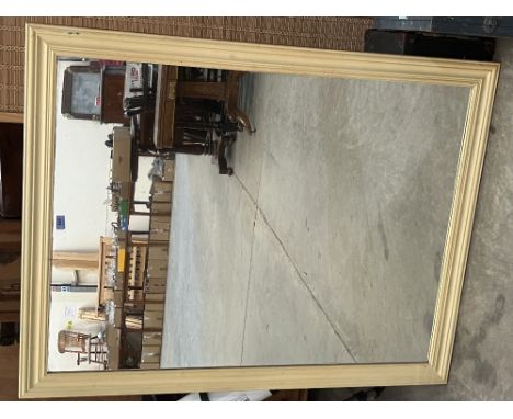 A wall mirror with painted frame. 53' x 41'