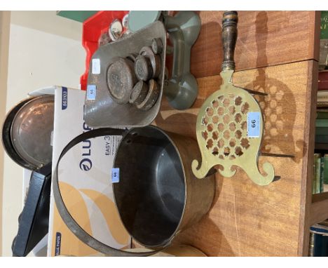A set of scales and weights; a brass trivet and a brass preserving pan
