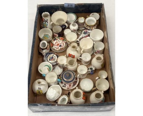 A collection of 19th century and later porcelain miniatures to include Royal Crown Derby, Coalport, Goss etc.