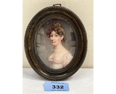 ENGLISH MINIATURIST. 19TH CENTURY  Portrait of a lady, quarter length wearing a low cut pink dress. 3¼' x 2½' oval