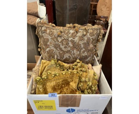 A box of vintage curtains, cushions and other textiles