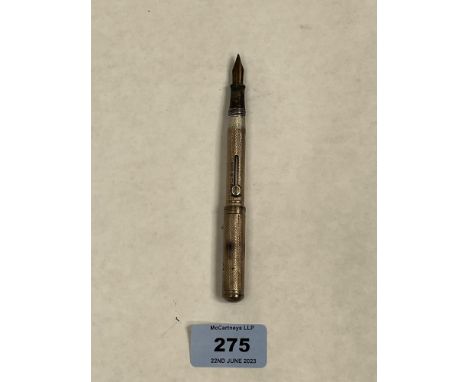 A Watermans Ideal silver pump fill fountain pen with nib marked 14k. 3¾' long