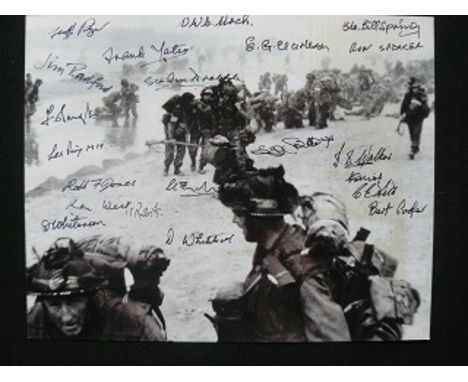 D Day Photo Signed 20 Normandy Veterans. 10 x 8 b/w photo signed by Gunner John Ainsworth - 10th Survey Royal Artillery, Sign