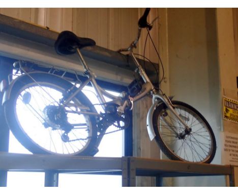 13 inch frame 6 speed Raleigh folding bike equipped with Shimano Revoshift and Promax breaks. Not available for in-house P&am