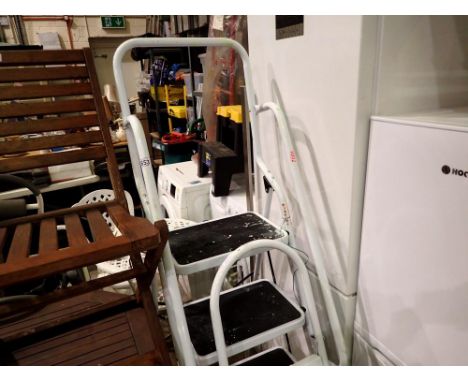 Two pairs of step ladders, four step and two step. Not available for in-house P&amp;P 