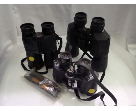 Three modern binoculars to include a Zenith 8x30. UK P&amp;P Group 3 (£30+VAT for the first lot and £8+VAT for subsequent lot