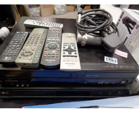 Panasonic VHS-DVD recorder DMR-EZ49V and LG DCD rec with Freeview box. All electrical items in this lot have been PAT tested 