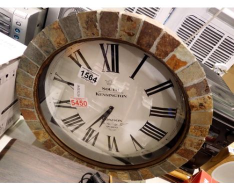 Circular stone cased wall clock. Not available for in-house P&amp;P 