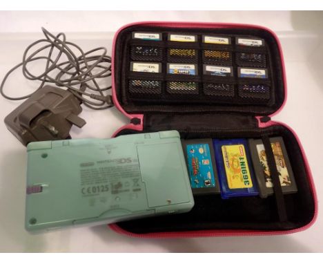 Nintendo DS Lite and thirty games with case and charger. UK P&amp;P Group 2 (£20+VAT for the first lot and £4+VAT for subsequ