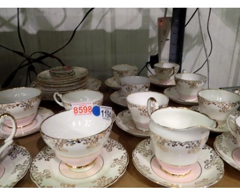 Thirty four pieces of Regency Ceramics teaware. Not available for in-house P&amp;P 