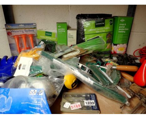 Shelf of gardening tools including netting. Not available for in-house P&amp;P 