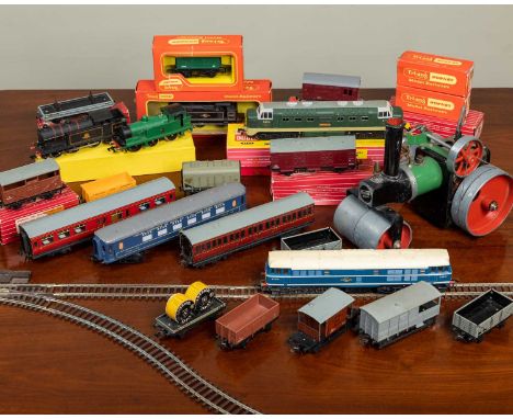 A collection of Hornby Dublo and Triang '00' gauge locomotives, rolling stock and track, together with a Mamod steam rollerIn