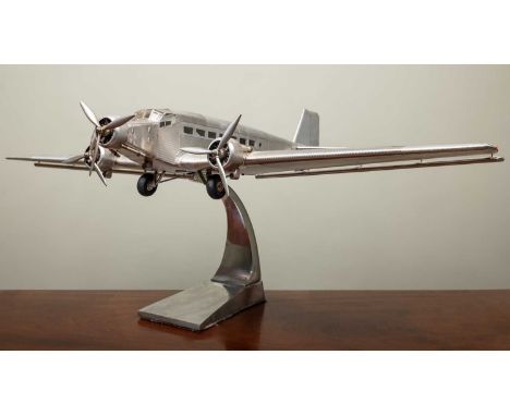 An aluminium Authentic Models Ltd scale model of a Junker JU52 'Iron Annie', with adjustable ailerons and cast aluminium stan