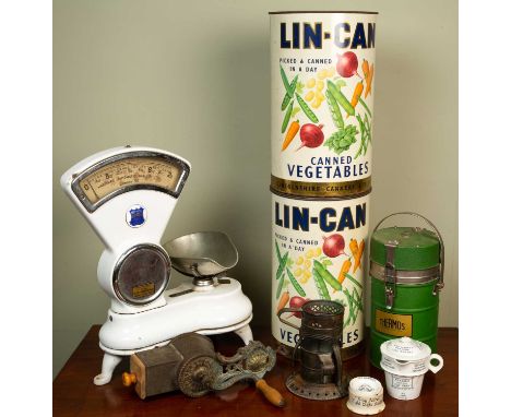 A set of kitchen scales, a Clarkes food warmer, a grater, two large tins, etcAll as found