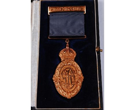 A Kaisar-i-Hind medal silver gilt for Public Service in India, with integral top riband bar, in original HM Mint Calcutta lea