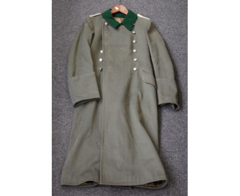 A German Army Officer's Great coat.   Condition Report / Extra Information  Some plucking and wear to the silk interior.Stitc