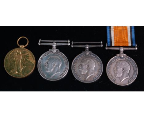 A WW I Victory medal, naming 8027. PTE. 8027. PTE. A.T. WOLLETT. 24 - LONd. R., together with three British War medals, namin