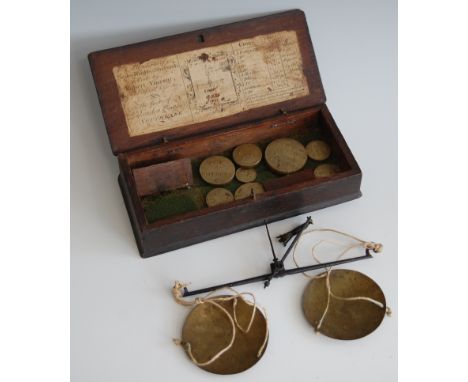 An 18th century mahogany cased set of coins scales and weights, bearing label for Robert Vincent, No.1 The Foot of London Bri