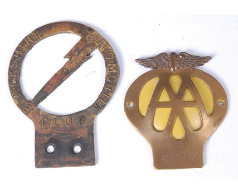 A Blackshirt Automobile Club brass car badge,14cm, together with an AA car badge. (2)