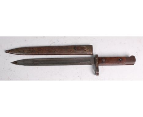 An Austrian Model 1895 bayonet, having a 25cm single edged fullered blade, stamped to the ricasso CE with WG below and number