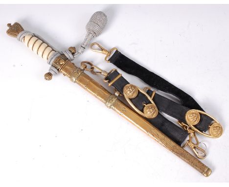 A German Third Reich Kriegsmarine Officer's dagger, the 25cm etched double fullered blade stamped to the Ricasso WKC with Kni