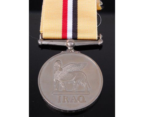 An Iraq medal (2004) naming 25106686 CFN K J C ROSS REME.